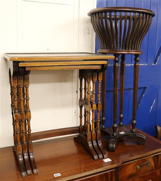 A nest of three leather topped coffee tables and a mahogany jardiniere stand, stand H.82cm